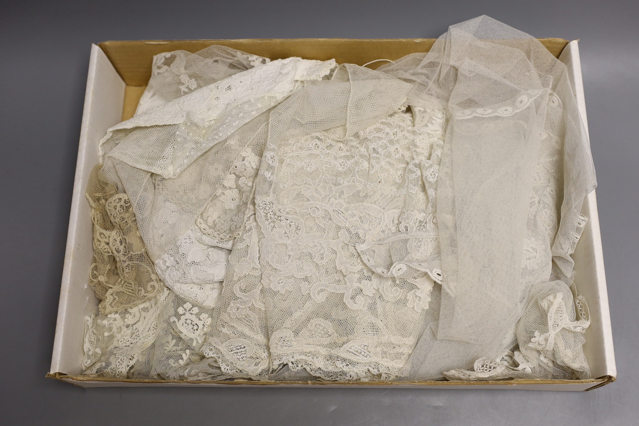 19th century Brussels bobbin lace bonnet veil, a Honiton edged and spot motif veil, a needle run veil and bonnet veil, two needle run collars, a Carrick & Cross collar and two pairs of sleeves.